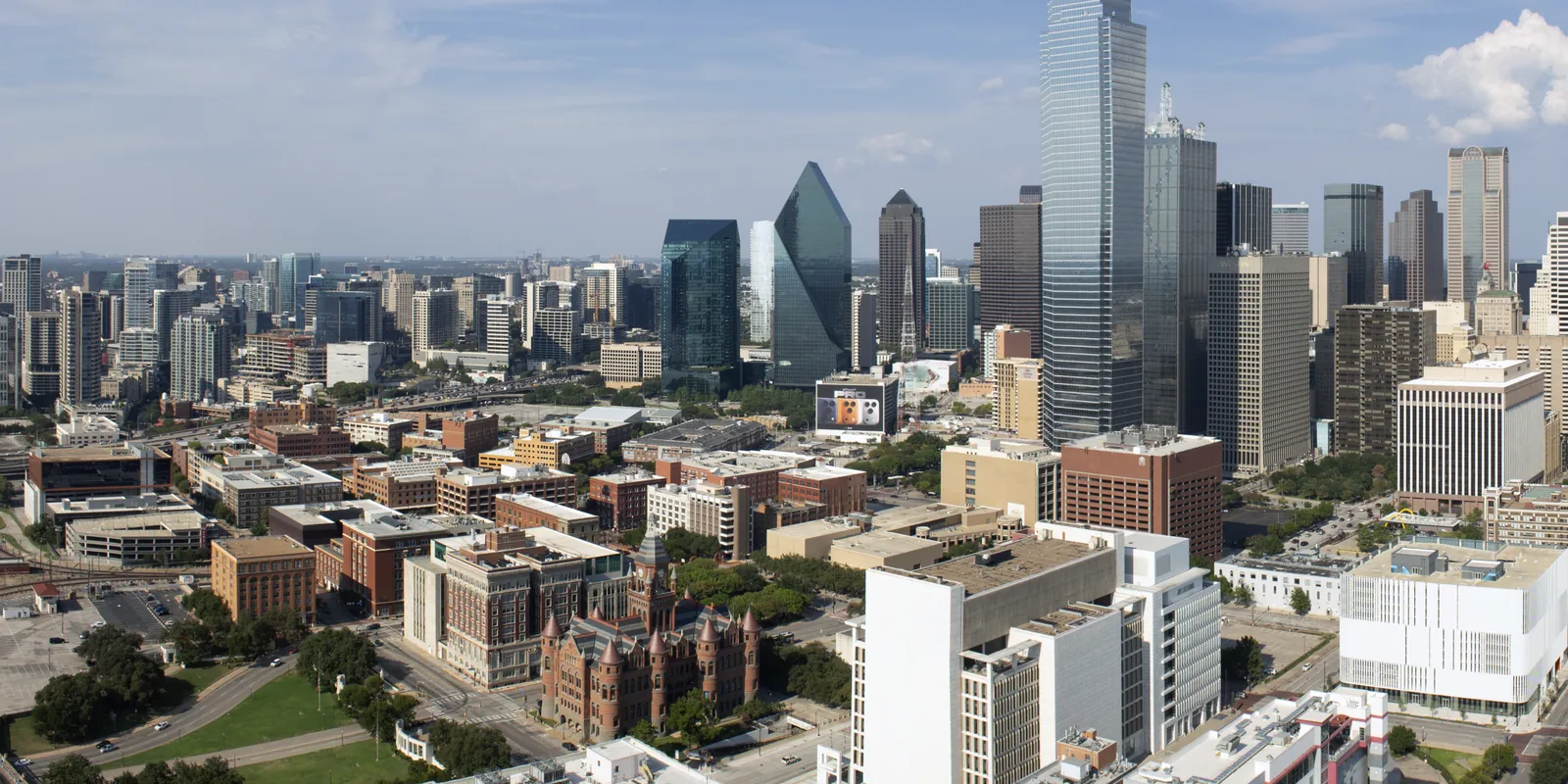 Downtown Dallas skyline on a sunny day, seen from above. Dallas is home to the Texas Stock Exchange, NYSE Texas and Nasdaq Texas.